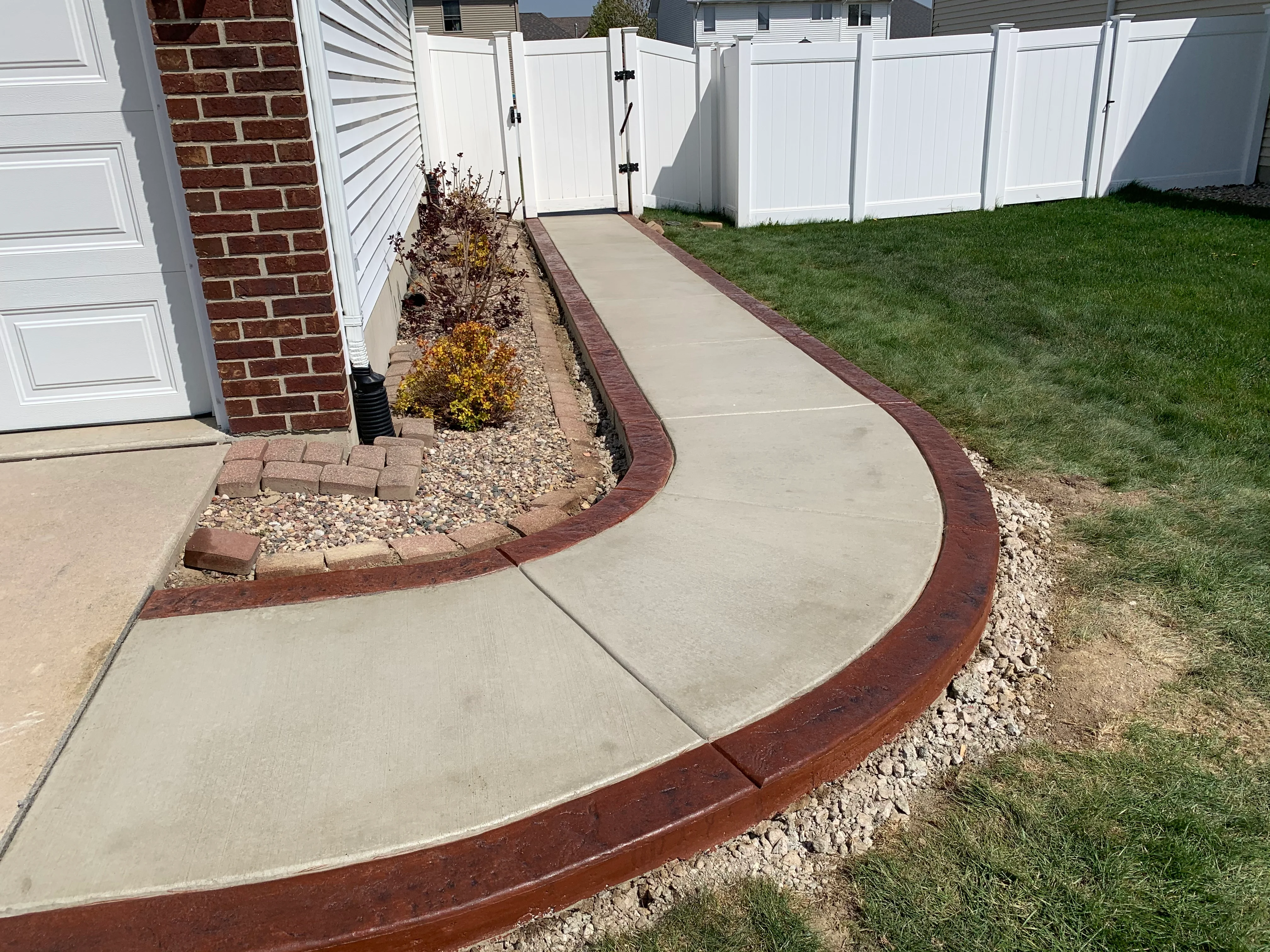Hoosier Concrete Final Stamped concrete walkway connecting patio to home in Northwest Indiana
